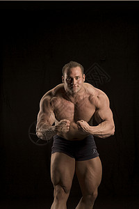 身体构造器手臂哑铃二头肌力量肌肉起重男人健身房背景图片
