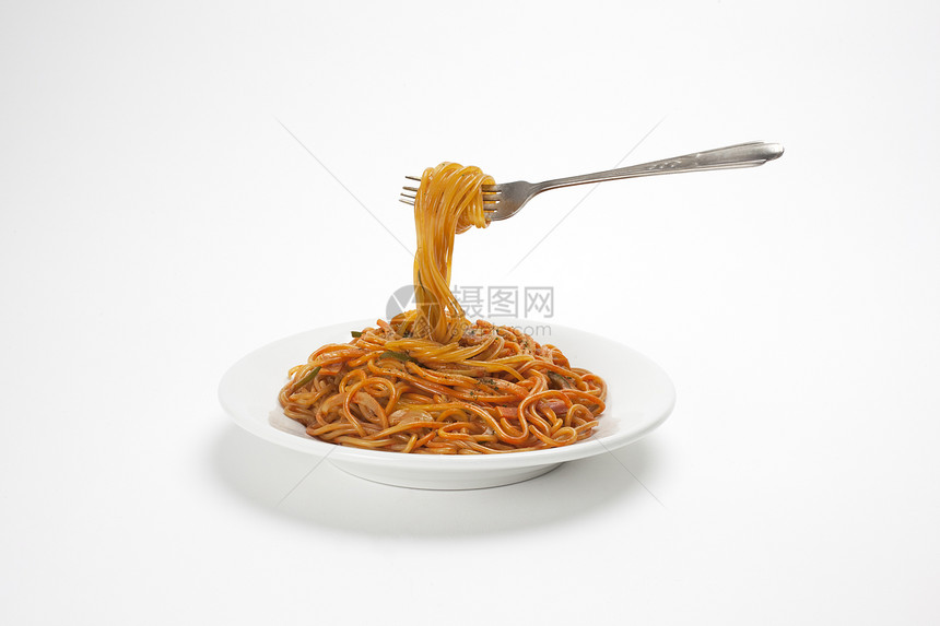 带叉子的意大利面条酱料饮食物体晚餐化合物红色美食用餐餐厅美食家图片
