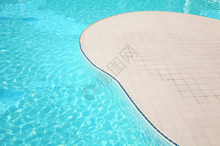 游泳池反射海浪涟漪游泳娱乐活动波纹水池闲暇酒店背景图片