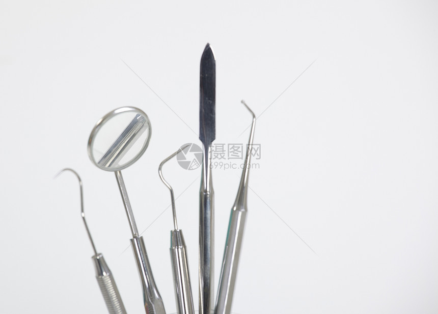 一套用于牙齿牙牙牙牙科护理的金属医疗设备工具卫生标量挖掘机镊子矫正牙科镜子探测刮板诊所图片