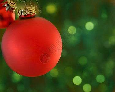 圣诞球蜡烛装饰绿色饰品红色橙子烛光背景图片