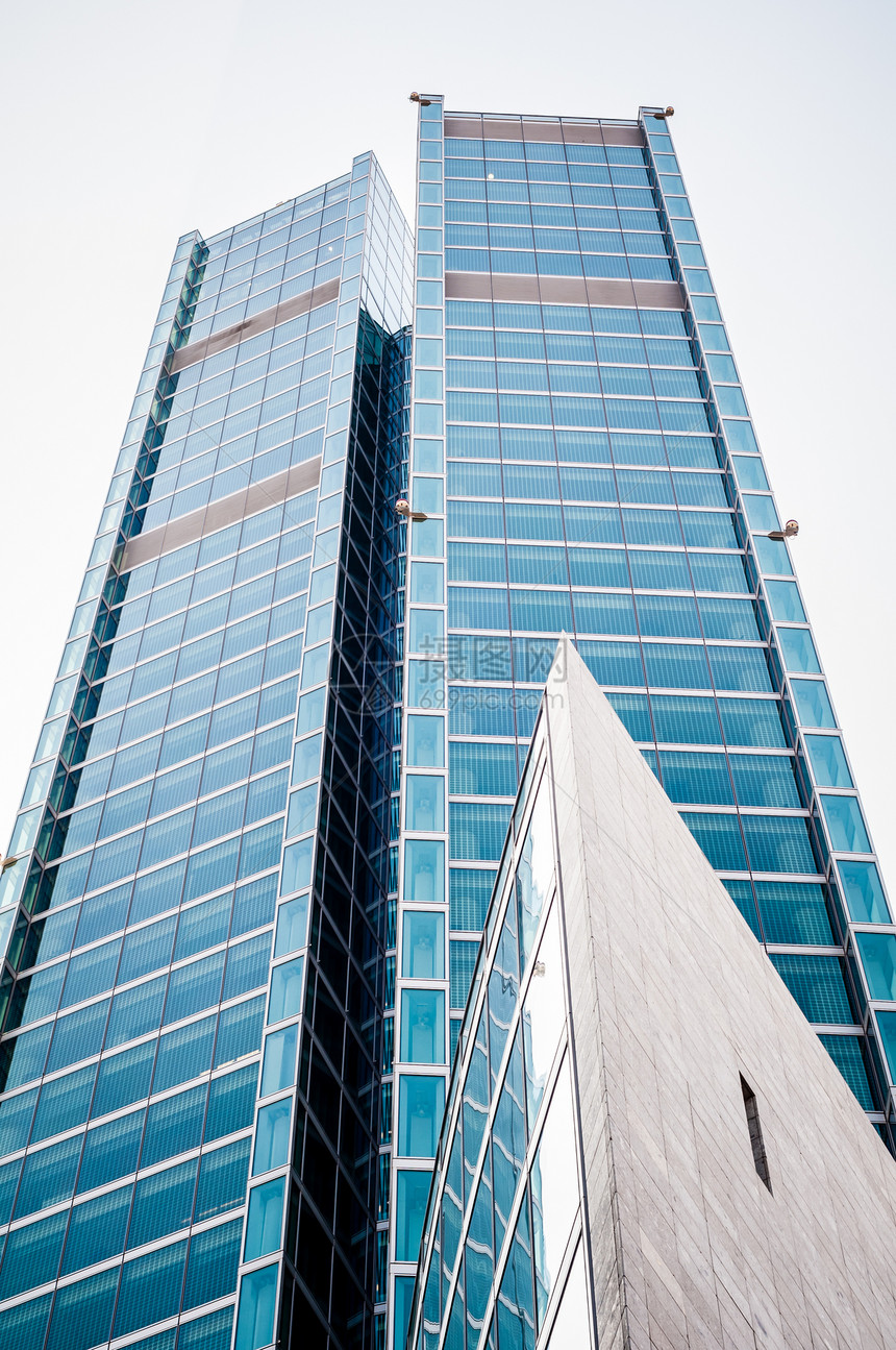 商业建设建筑物玻璃摩天大楼城市市中心反射蓝色天空景观公司图片