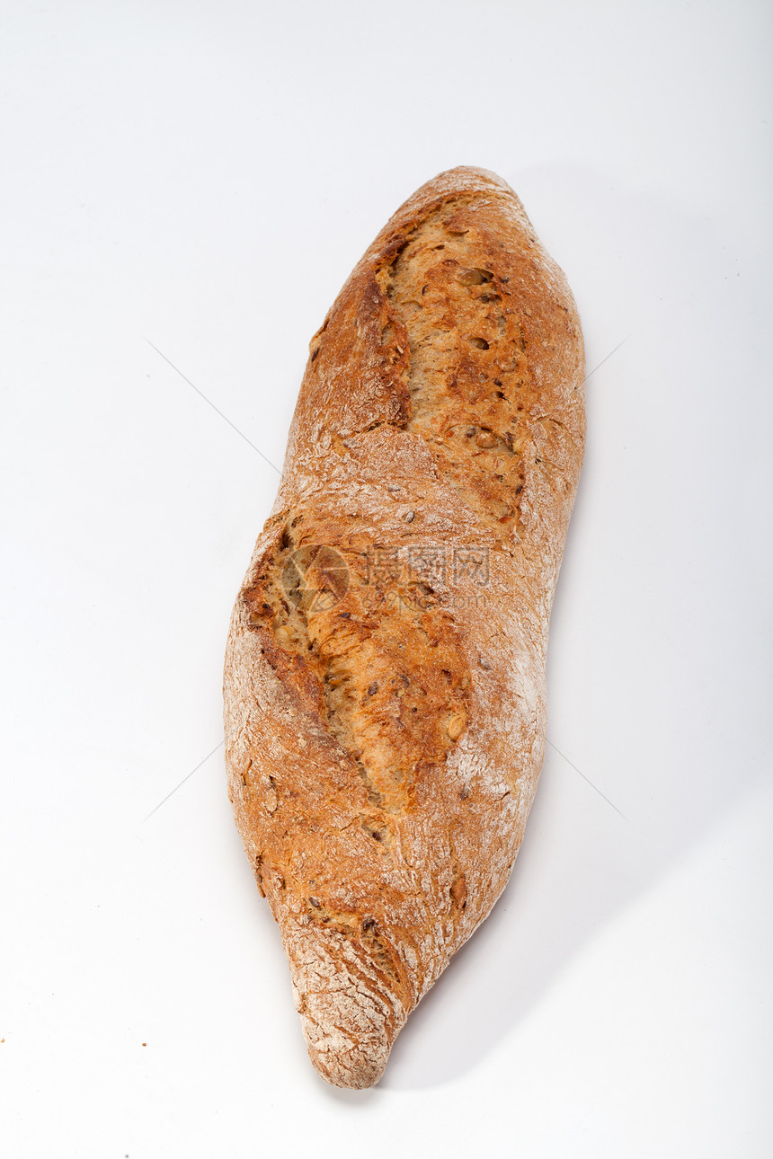 传统烤熟面包的大型小面包小麦饮食谷物麻布乡村厨房纤维燕麦脆皮耳朵图片