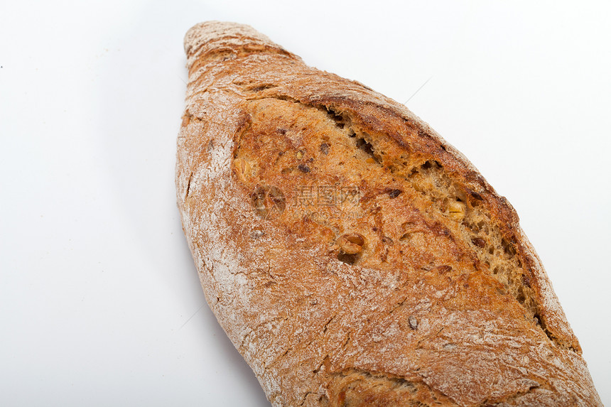 传统烤熟面包的大型小面包美食麻布宏观乡村耳朵饮食植物玉米静物种子图片