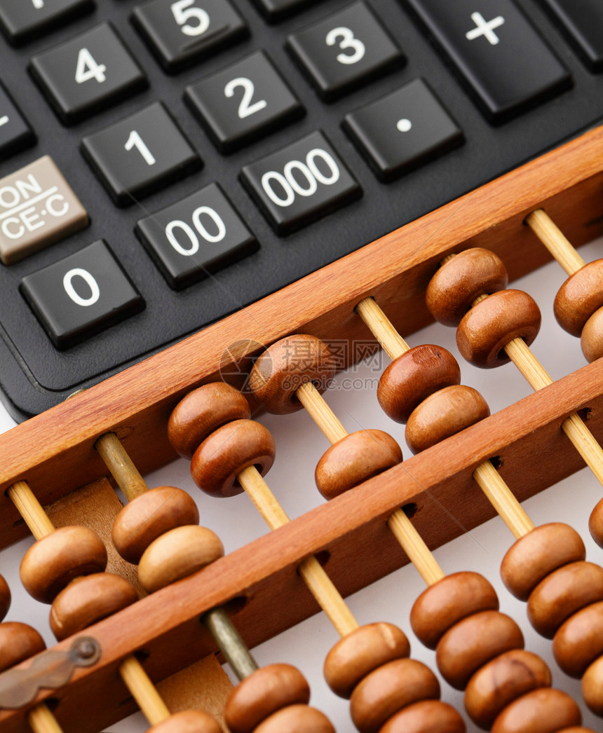 计算器和算盘经济商业会计木头棕色算术数字珠子金融古董图片