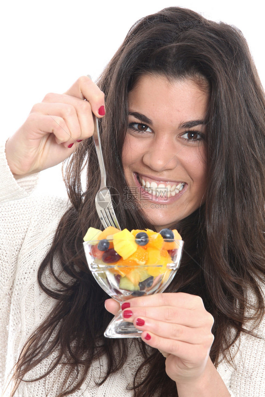 女青年食用新鲜水果沙拉鲜果沙拉女士面孔头发白色吸引力图片