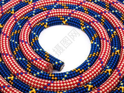 攀爬绳子的岩浆运动白色红色爱好黑色蓝色安全线圈背景图片
