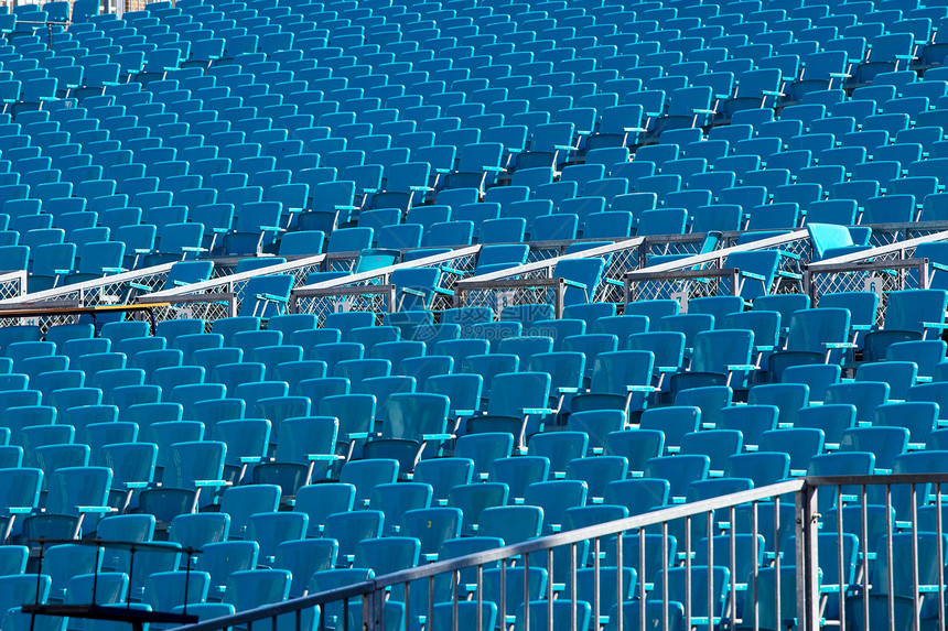 椅子礼堂学校观众蓝色大厅座位运动会议会场塑料图片