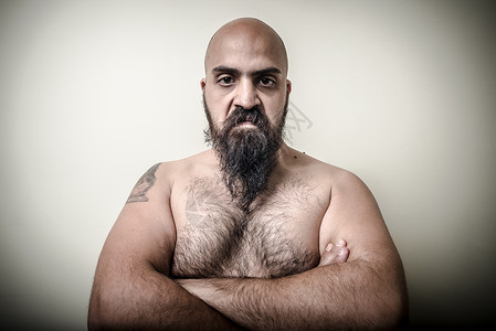 超级超级强权愤怒的肌肉大胡子男子力量秃顶胡须胸部天才神灯工作室男人背景图片