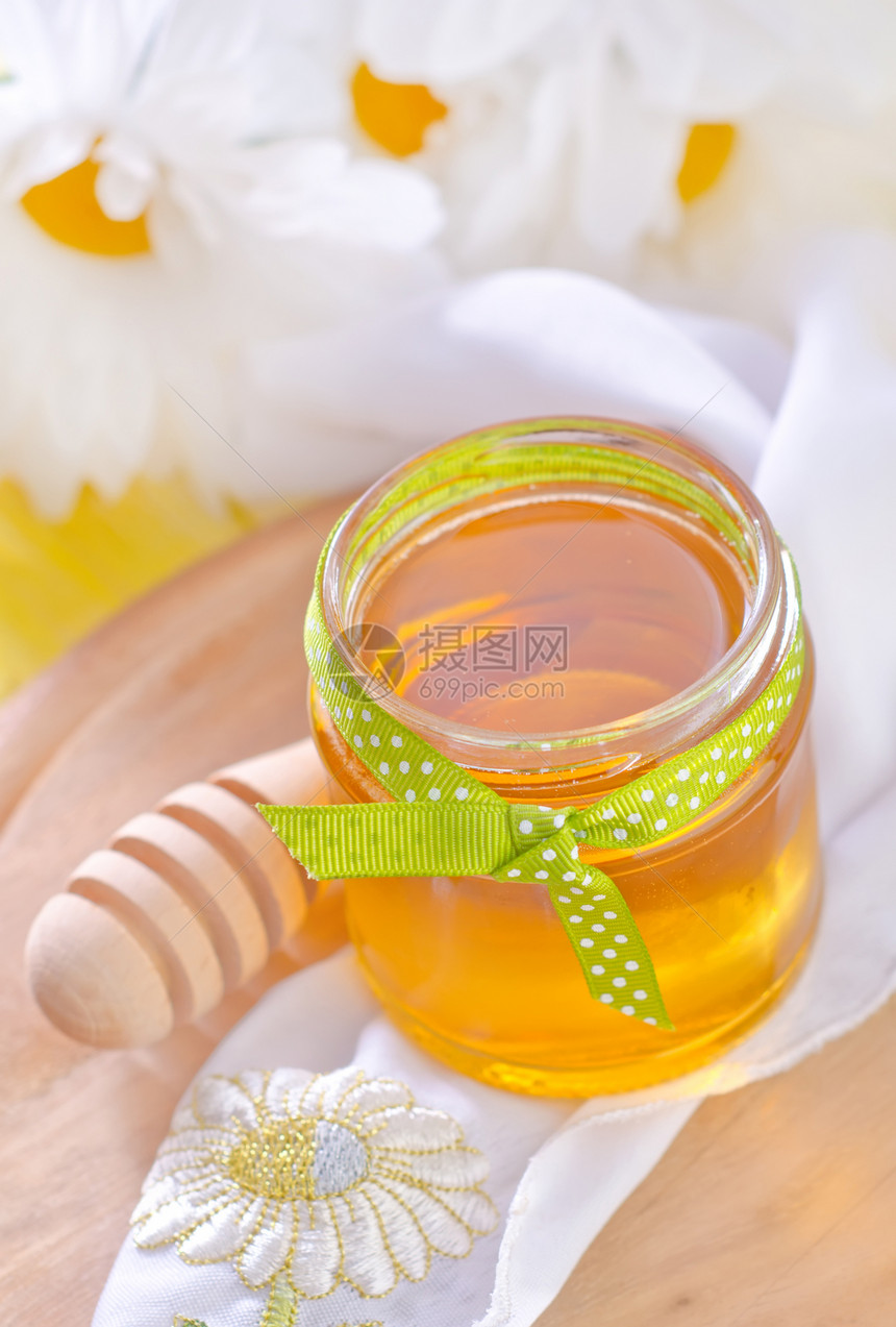 蜂蜜液体蜂窝甜点金子产品酱料蜜蜂蜂巢花絮毛毛雨图片
