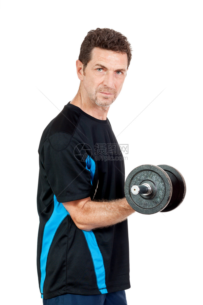 与铁哑铃隔离的有吸引力的成年男子二头肌重量男性运动健美健身房火车权重训练成人图片