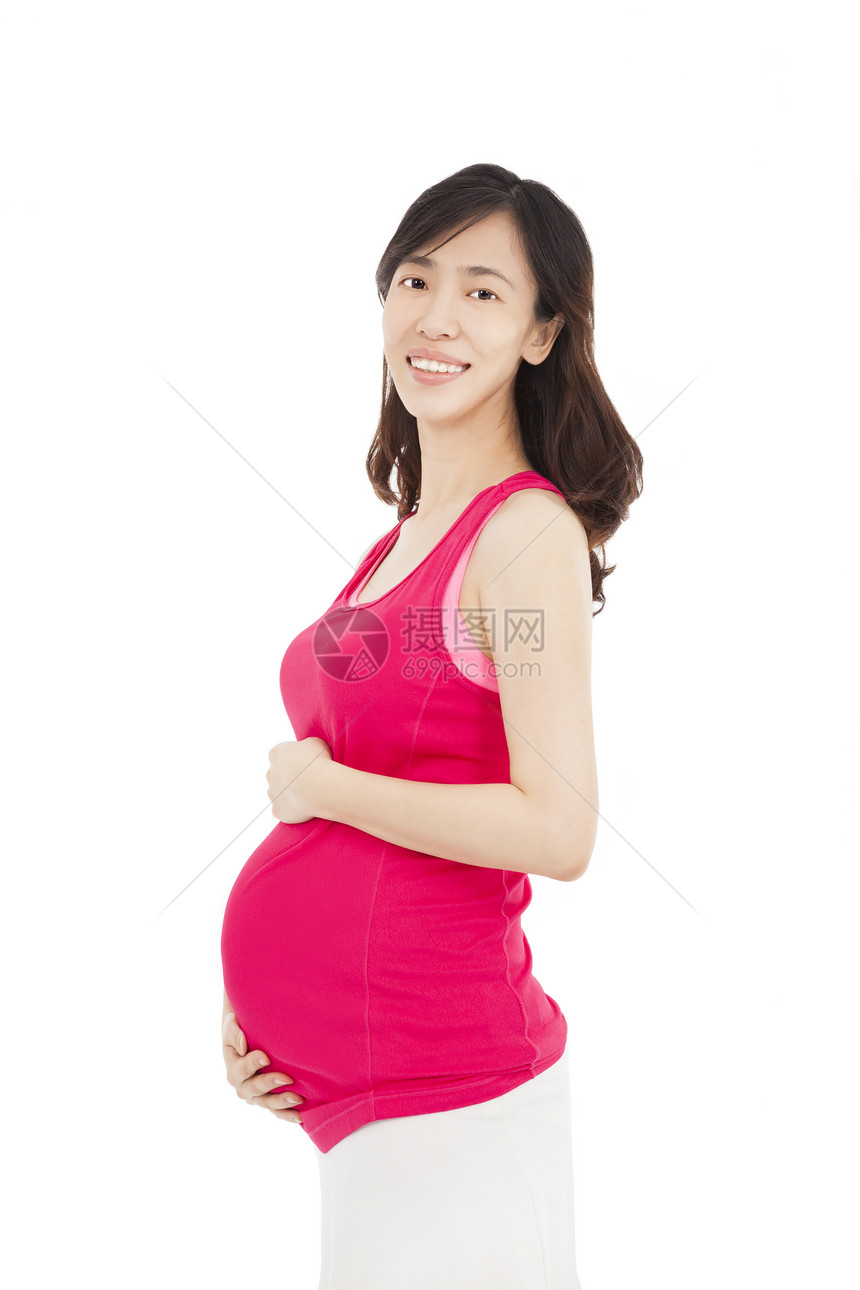 怀孕的美丽的年轻少女图片