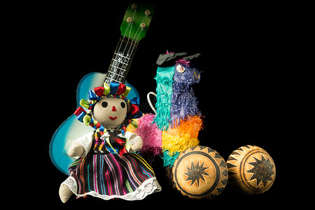 墨西哥娃娃和玩具皮纳塔黑色艺术乐趣艺术家背景吉他背景图片