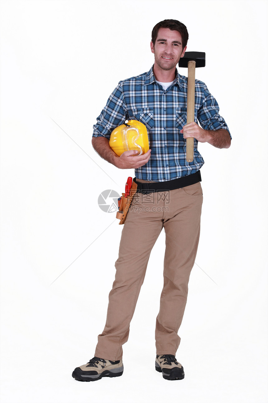 手匠拿着一把大锤子零售商建造安全男人工作工具木匠安全帽工人维修图片