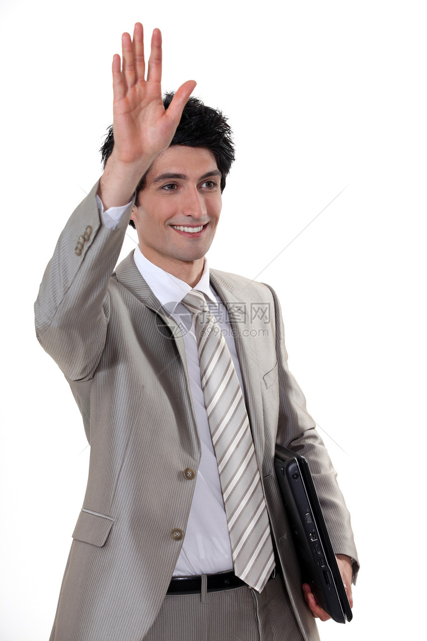 一个商务人士向某人挥手图片