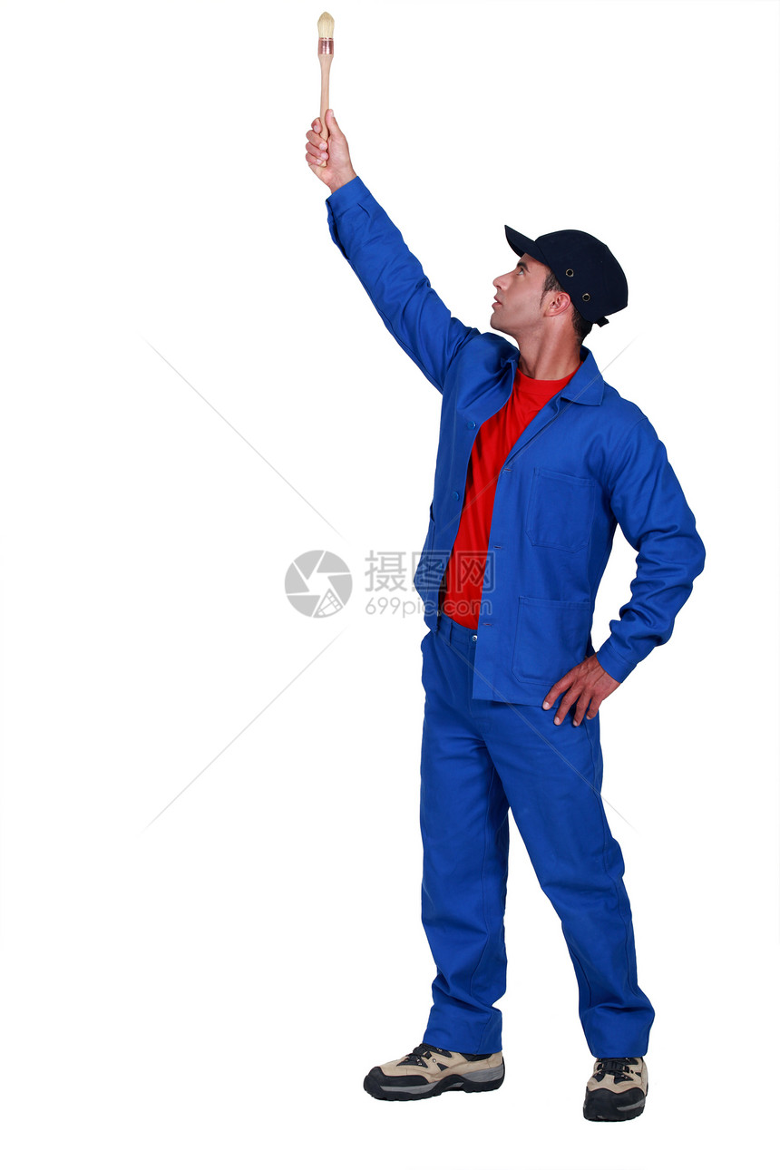 白色背景上孤立的画家工人工具蓝色工装裤天花板男人房间装修刷子工作图片