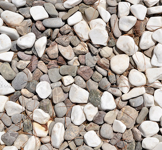 佩布背景背景卵石支撑墙纸黑色矿物海滩灰色花园岩石宏观背景图片