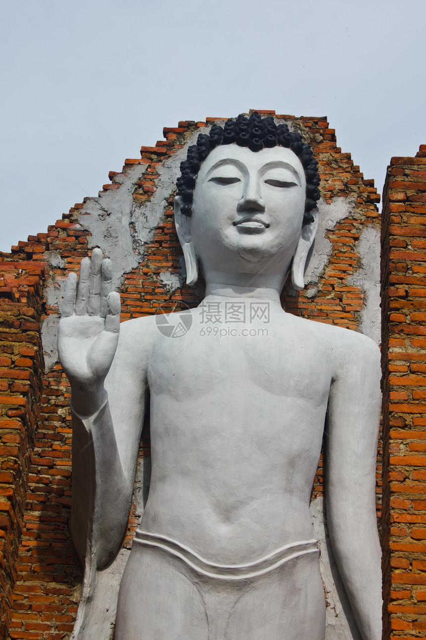 在寺庙的佛像吸引力地标佛教徒文化太阳首都宗教天空石头佛塔图片