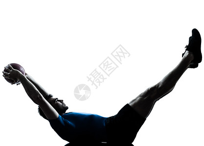 保持健身球姿势的锻炼运动员有氧运动双腿训练运动体操腹肌阴影仰卧起坐男性健美背景图片