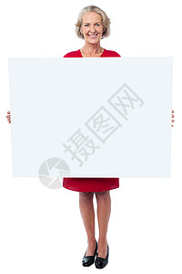 拿着空白广告板的光辉女人背景图片
