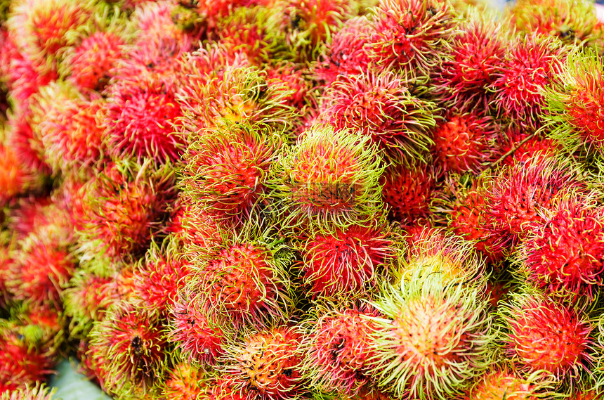红布丁市场红色热带水果收成图片