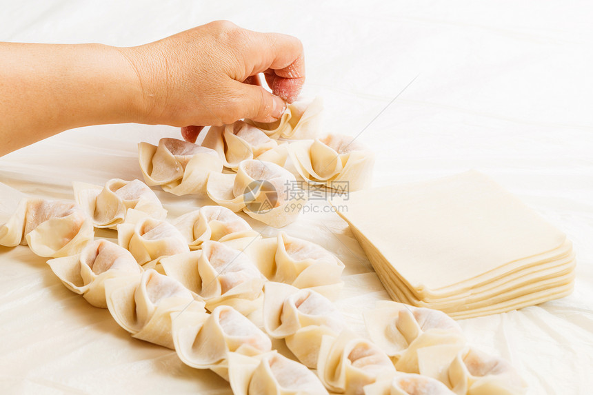 人手自制包装烹饪手工水角月球蔬菜农历新年饺子节日图片