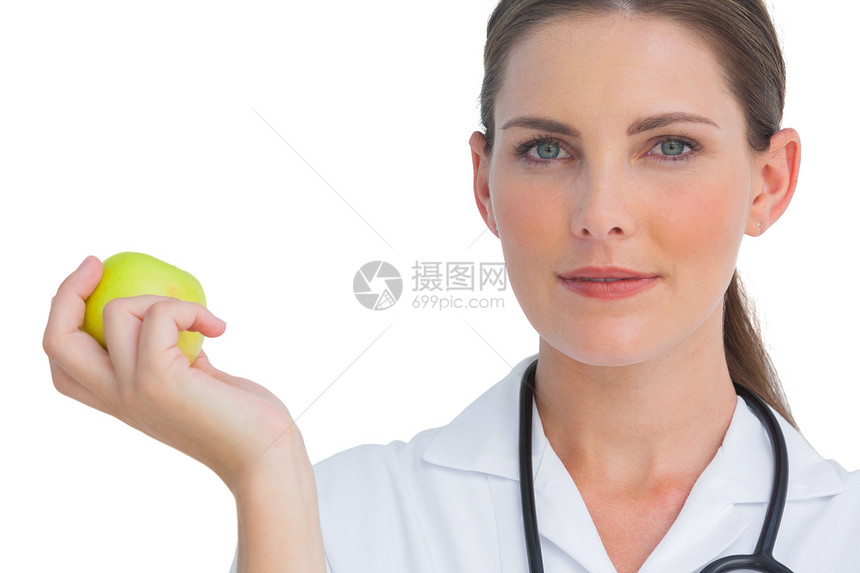 护士笑着拿着苹果抱着一个苹果图片