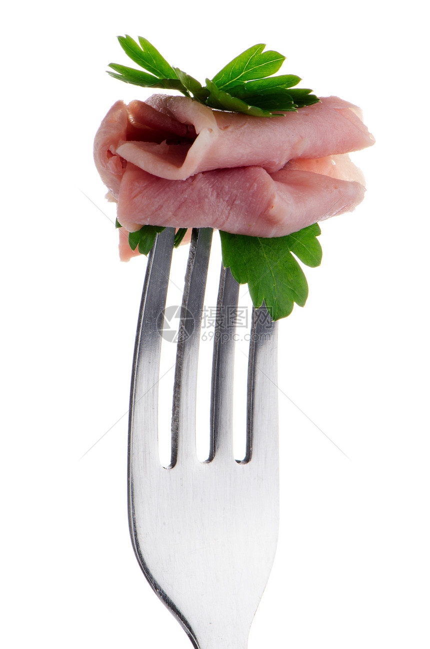 火腿的切片在叉子上被割断小吃猪肉白色熏制饮食粉色生物倾斜图片