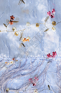 蓝丝材料丝绸围巾织物蓝色背景图片