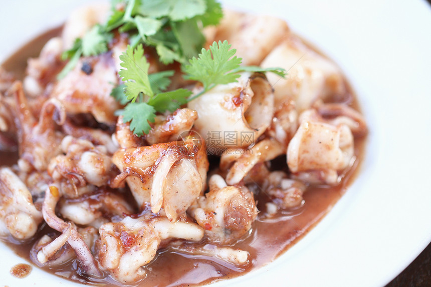 用鱿鱼制成的食物海鲜美食餐厅面条章鱼乌贼摄影小麦饮食寿司图片