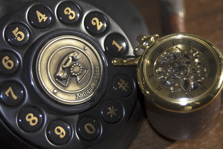 旧对象时间古董手表电话古物背景图片