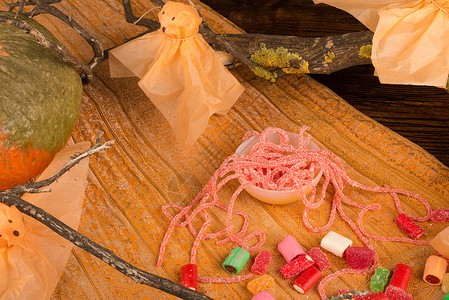 把戏或治疗捣乱或治疗静物派对甘草季节性糖果童年水平传统幽灵软糖背景