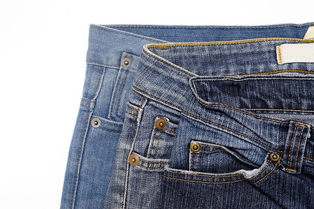 Denim 细节棉布材料衣服织物裤子牛仔布蓝色纺织品口袋背景图片