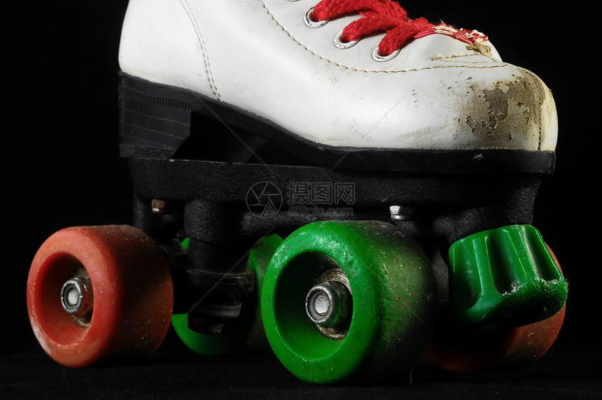 消耗的滚式滑板轮子靴子娱乐车轮鞋带乐趣孩子皮革蕾丝溜冰者图片