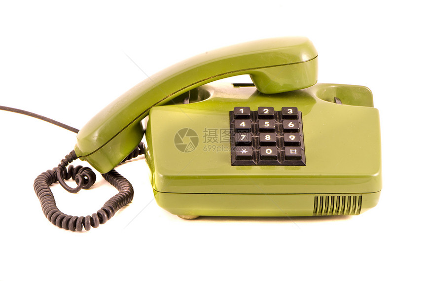 白色背景上隔离的绿色复古电话图片