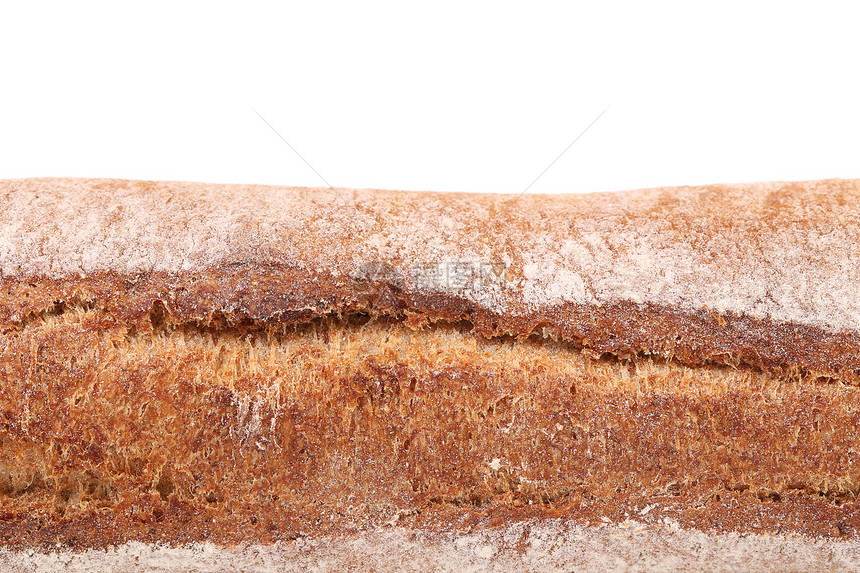 一条黑麦面包加面粉图片