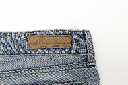 Denim 细节牛仔布衣服材料纺织品蓝色裤子棉布织物口袋背景图片