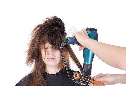 女人喜欢吹发光的滋味女性外貌黑发享受发型设计造型师女士刷子极乐发型背景图片