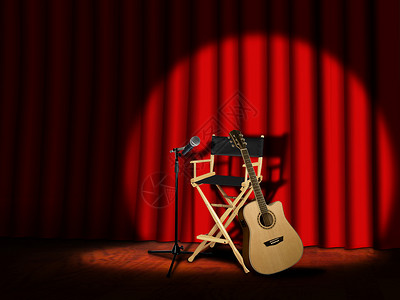 与幕幕台上的麦克风和吉他背景图片