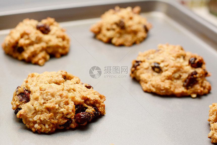 新鲜烤燕麦饼饼干选择性烹饪甜点烘烤食物小吃曲奇表葡萄干麦片面团图片