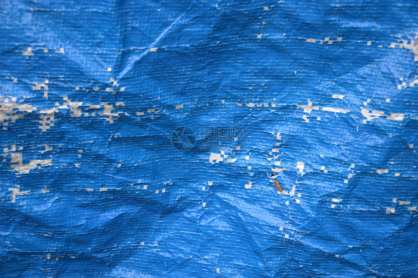 蓝色塑料帐篷的抽象纹理石头古董损害水泥风化老化建筑材料乡村建筑学图片