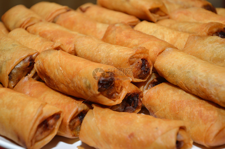 弹簧卷烹饪午餐盘子辣椒脂肪点心小吃油炸蔬菜自助餐图片