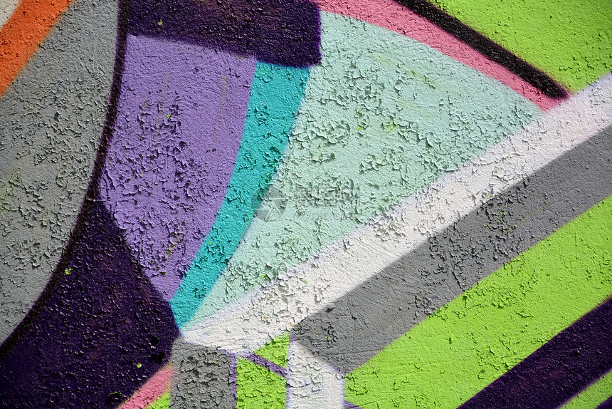 旧墙上涂着色彩多彩的涂鸦创造力艺术石头街道图片