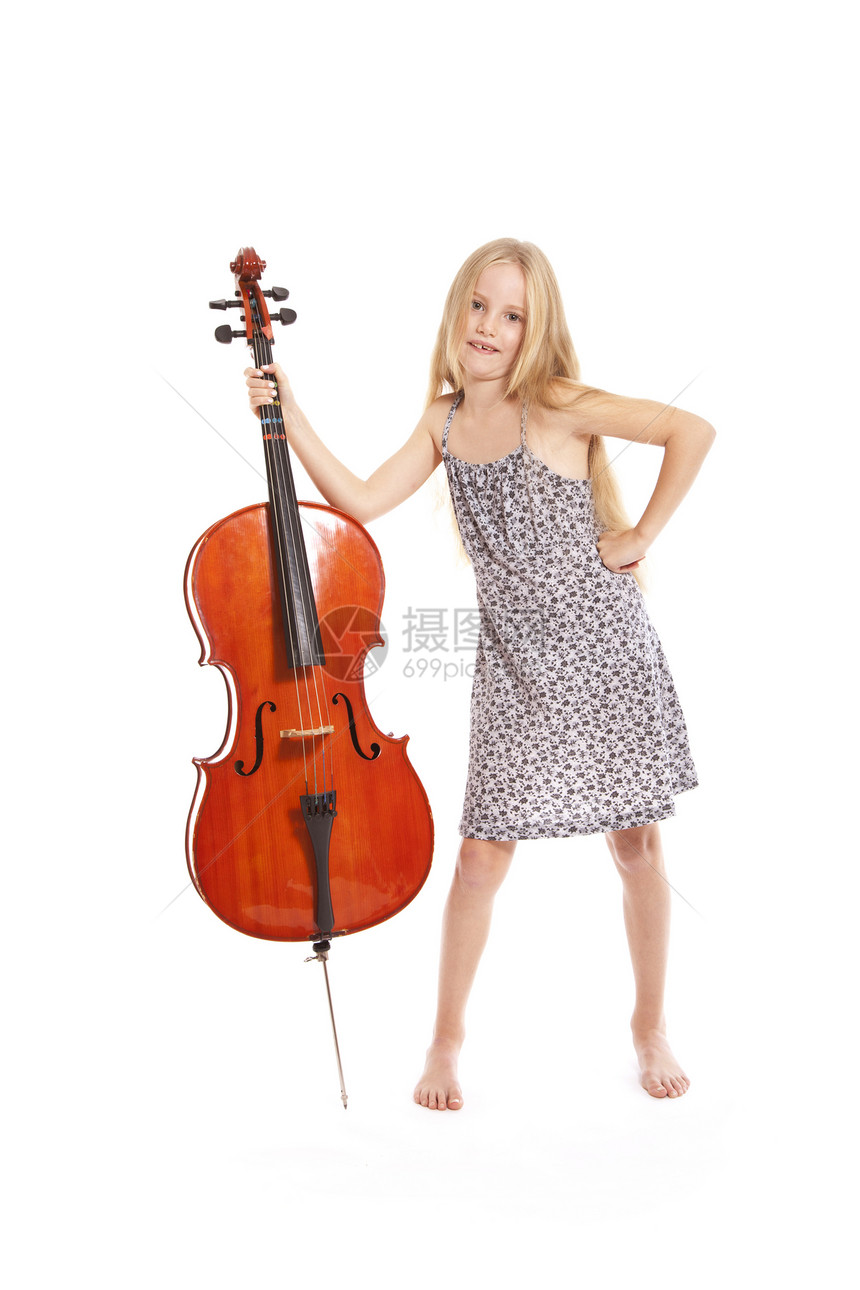 身着服装和大提琴的少女工作室金发女性字符串冒充幸福音乐会生活木头音乐图片