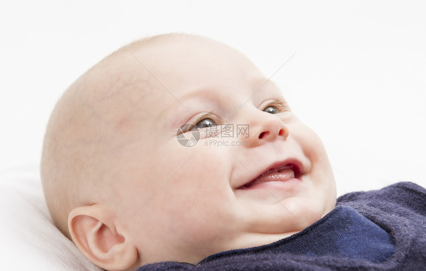 微笑的待读工具孩子儿童新生灰色舌头哺乳期婴儿背景快乐图片