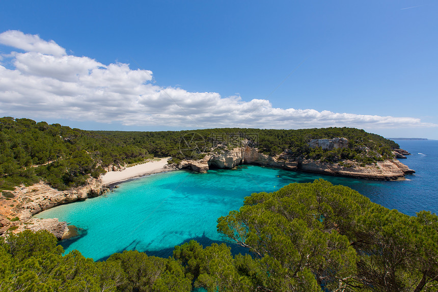 Balearics市的卡拉 米蒂雅内塔海洋岩石海滩海岸线假期树木地标海景旅行石头图片