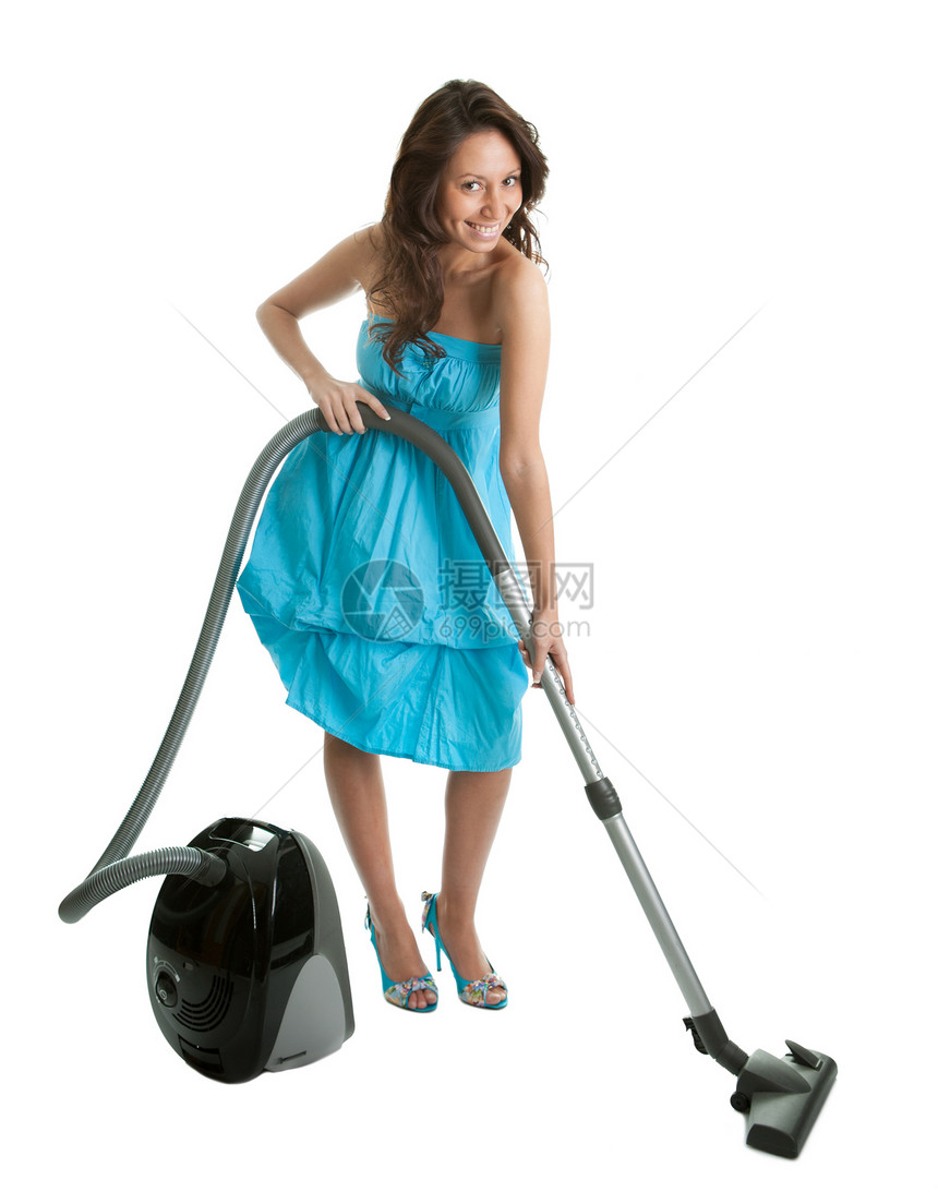 与手持式真空清扫器相配的开心女人生活打扫青色女性家务主妇家庭裙子白色家政图片