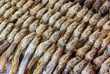 干咸咸鱼海鲜腌鱼市场美食国王盐渍背景图片
