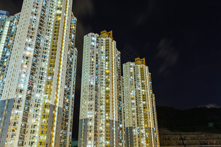 夜间在香港的住宅楼人口住房建筑城市公寓高楼景观摩天大楼公寓楼天际黄昏高清图片素材
