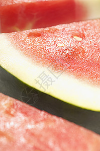 新鲜西瓜切片水果食物焦点选择性背景图片